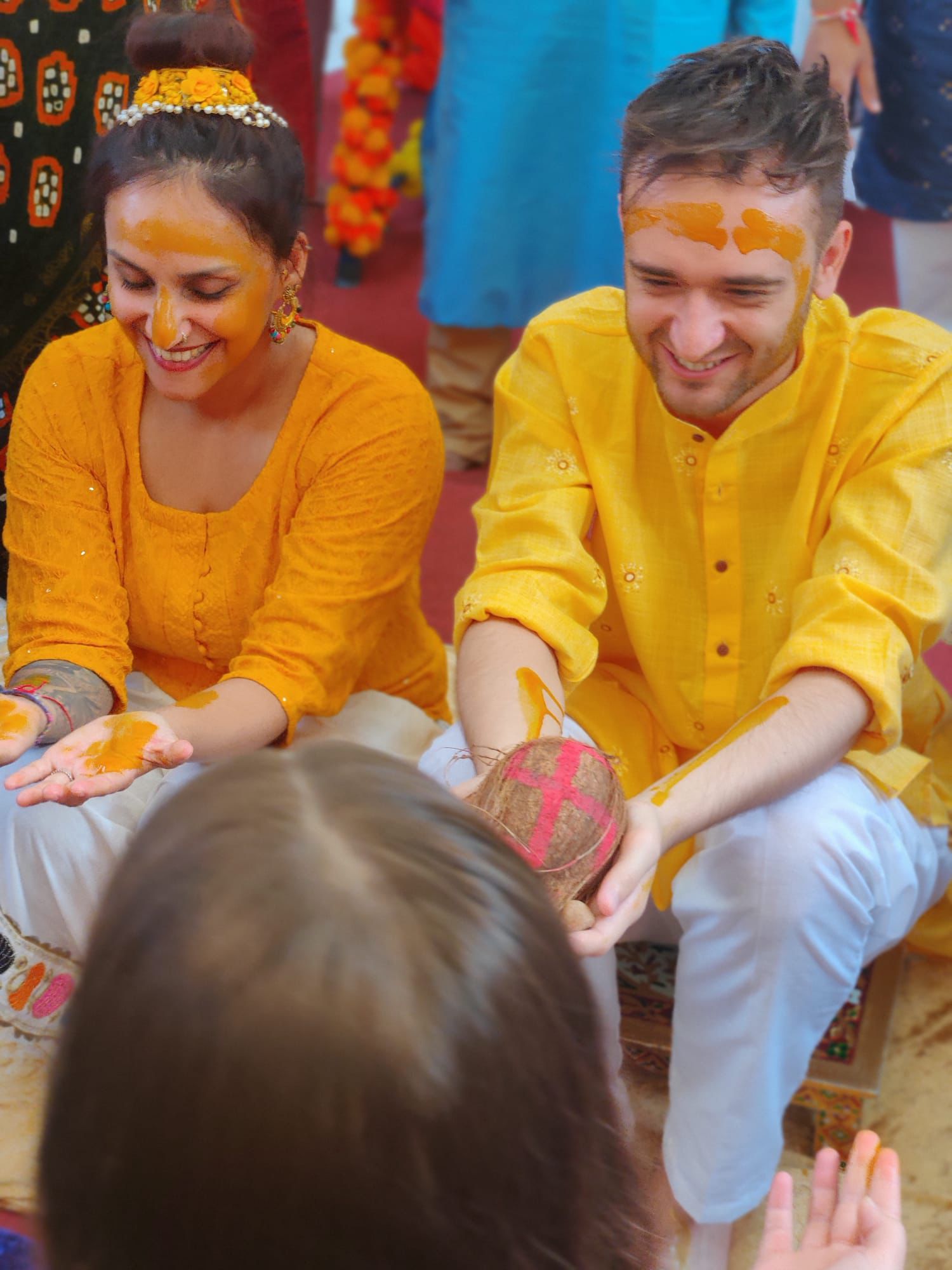 Krishna and Matt celebrating their pithi ceremony